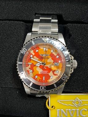 Montres Prestige X
Invicta Men's Watch 43mm,
Steel MPW-0268 Orange camo face